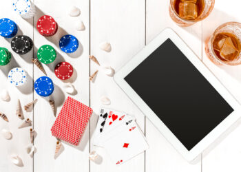 Post blog social media poker. View from above with copy space. Banner template layout mockup for online casino. Wooden white table, top view on workplace. Banner for online casinos and gambling
